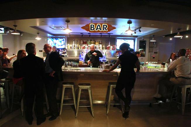 The bar area is seen during the grand opening party for The Commissary Latin Kitchen at the Downtown Grand Tuesday, Jan. 21, 2014.