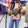 Lenny Payne plays Jimi Hendrix in front of Slotzilla in Fremont street experience Wednesday, Jan. 22. 2014. 
