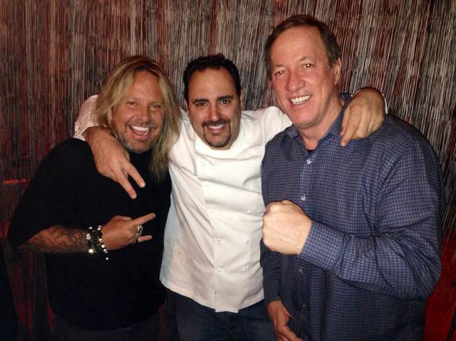 Vince Neil, chef Barry S. Dakake and Jim Kelly at N9NE Steakhouse in the Palms.