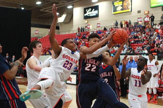 Bishop Gorman forward Nick Blair and Findlay Prep forward Kelly Oubre fight or a rebound during their game Saturday, Jan. 25, 2014 at the South Point. Gorman won 76-72 in overtime.