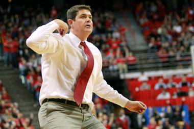 UNLV coach Dave Rice calls a timeout against Fresno State, Saturday, Jan. 25, 2014, at the Thomas & Mack Center. UNLV won 75-73 in overtime.