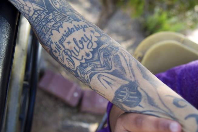 Francisco Diaz shows his first tattoo, made for his daughter Ruby, in Mexicali, Mexico Saturday, Jan. 25, 2014. Diaz was born in Mexico but grew up in Las Vegas with a green card.