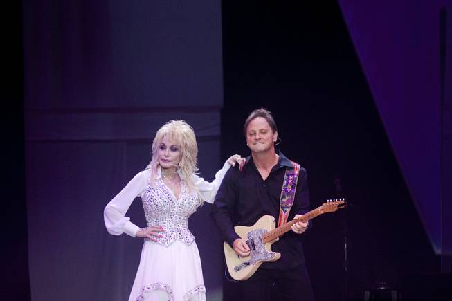 Dolly Parton performs during her “Blue Smoke World Tour” stop at Star of the Desert Arena in Buffalo Bill’s on Saturday, Jan. 25, 2014, in Primm.