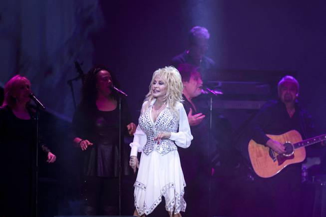 Dolly Parton performs during her “Blue Smoke World Tour” stop at Star of the Desert Arena in Buffalo Bill’s on Saturday, Jan. 25, 2014, in Primm.