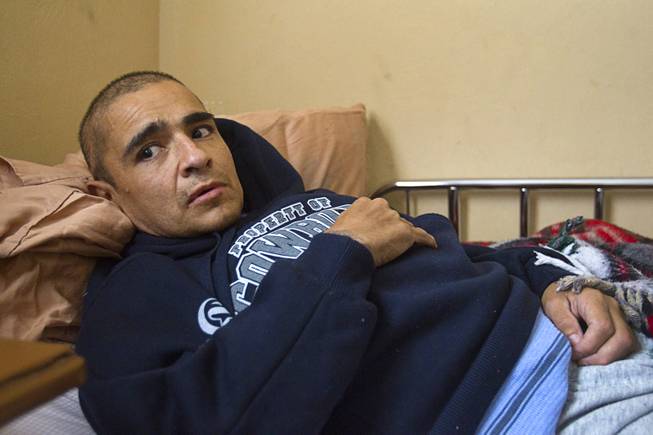 Francisco Diaz rests in an elderly care home where he recuperating from injuries in Mexicali, Mexico Sunday, Jan. 26, 2014. Diaz was born in Mexico but grew up in Las Vegas with a green card. Diaz was beaten and robbed after he was deported to Mexicali.