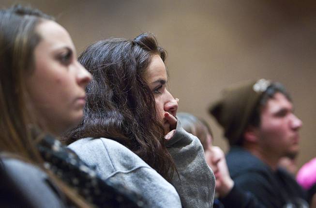 Miranda Rosen, a Coronado High School senior, listens to Ret. Major Leonard Berney at Congregation Ner Tamid in Henderson Monday, Jan. 27, 2014. Berney was a member of British forces that liberated the Bergen-Belsen concentration camp during Word War II. The presentation was part of International Holocaust Memorial Day.