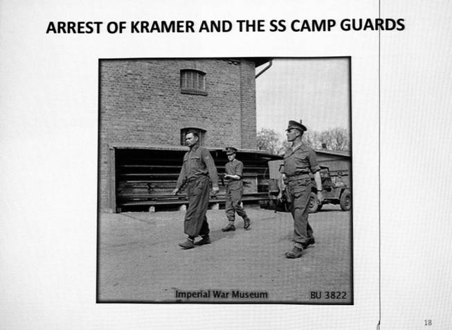 A photo shows the arrest of Josef Kramer, commandant of Bergen-Belsen concentration camp, during a presentation by Ret. Major Leonard Berney at Congregation Ner Tamid in Henderson Monday, Jan. 27, 2014. Berney was a member of British forces that liberated the concentration camp during Word War II. The presentation was part of International Holocaust Memorial Day.