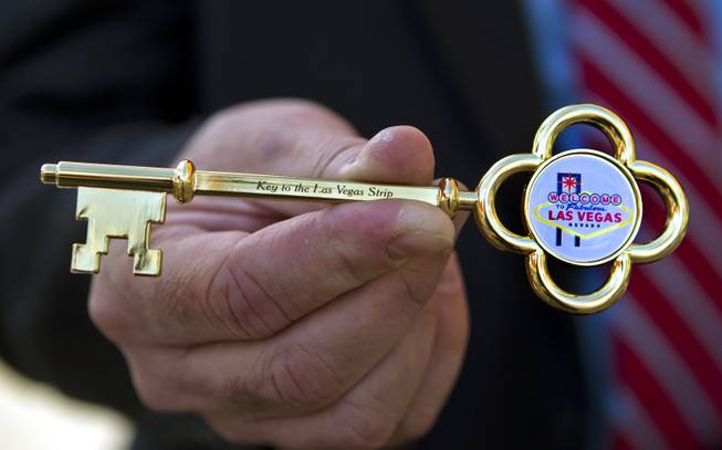 Chef Bobby Flay was presented with this Key to the Las Vegas Strip by Clark County Commissioner Mary Beth Scow during a ribbon-cutting ceremony for his Bobby’s Burger Palace on Wednesday, Jan. 29, 2014, on the Strip in Las Vegas.