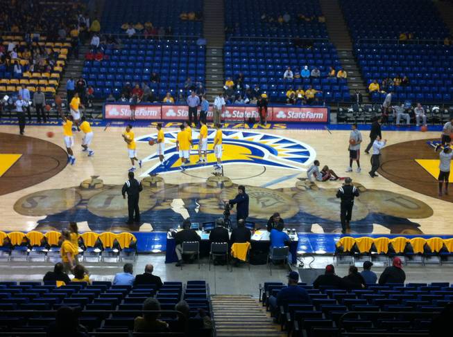 UNLV and San Jose State players warm up on the court before the teams' game on Wednesday, Jan. 29, 2014, at the Events Center in San Jose, Calif.