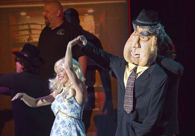 Old Fart (Enoch Scott) dances with his wife (Anita Bean) during a performance of "Pawn Shop Live!" at the Golden Nugget Thursday, Jan. 30, 2014. The production show is a parody based on the story of Gold & Silver Pawn, home of the History Channel's Pawn Stars television series.