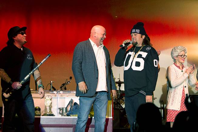 Rick Harrison, left, and Austin "Chumlee" Russell join cast members on stage after a performance of "Pawn Shop Live!" at the Golden Nugget Thursday, Jan. 30, 2014. The production show is a parody based on the story of Gold & Silver Pawn, home of the History Channel's Pawn Stars television series.