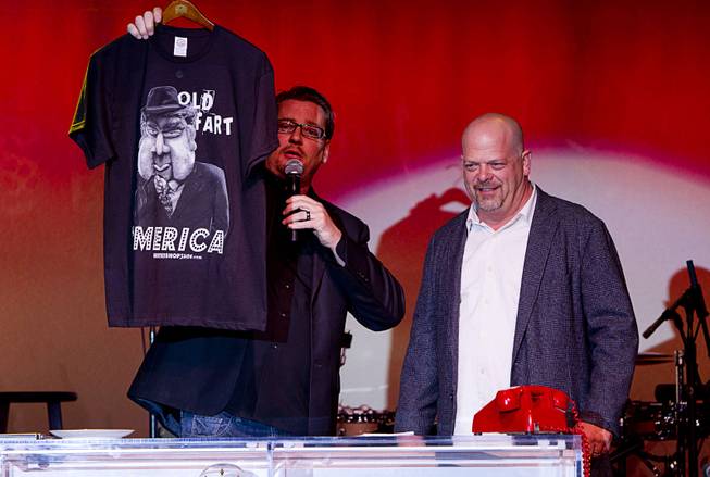 Derek Stonebarger, left, is joined on stage by Rick Harrison after a performance of "Pawn Shop Live!" at the Golden Nugget Thursday, Jan. 30, 2014. The production show is a parody based on the story of Gold & Silver Pawn, home of the History Channel's Pawn Stars television series. Stonebarger is the co-writer and producer of the show.