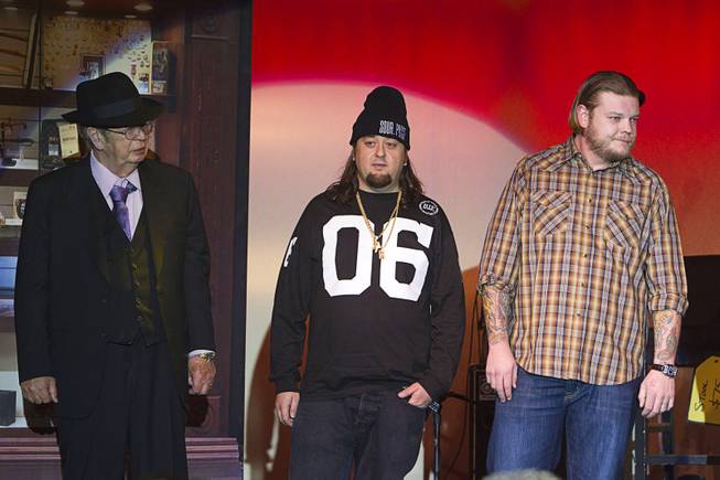 Richard "The Old Man" Harrison, left, Austin "Chumlee" Russell, center, and Corey "Big Hoss" Harrison are shown on stage after a performance of "Pawn Shop Live!" at the Golden Nugget Thursday, Jan. 30, 2014. The production show is a parody based on the story of Gold & Silver Pawn, home of the History Channel's Pawn Stars television series.