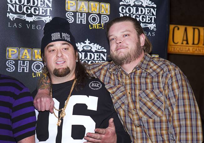 Austin "Chumlee" Russell, left, and Corey "Big Hoss" Harrison pose on the red carpet after attending a performance of "Pawn Shop Live!" at the Golden Nugget Thursday, Jan. 30, 2014. The production show is a parody based on the story of Gold & Silver Pawn, home of the History Channel's Pawn Stars television series.