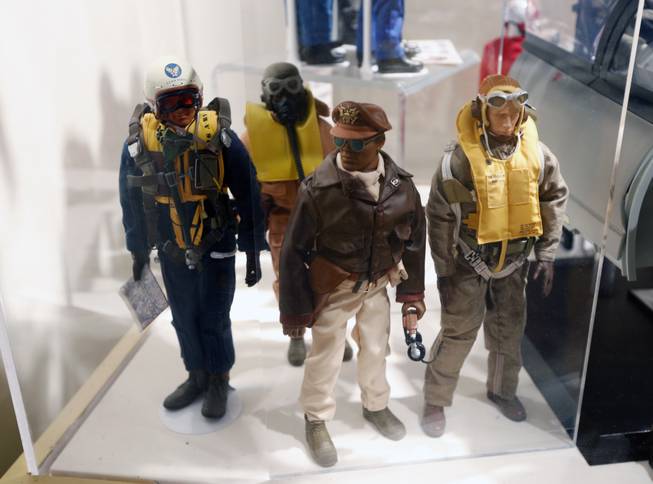 This Jan. 31, 2014, photo shows Tuskegee Airmen G.I. Joe action figures in a display at the New York State Military Museum  in Saratoga Springs, N.Y. A half-century after the 12-inch doll was introduced at a New York City toy fair, the iconic action figure is being celebrated by collectors with a display at the military museum, while the toy's maker plans other anniversary events to be announced later this month.