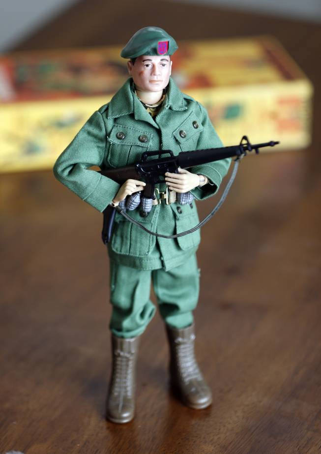 This Jan. 31, 2014, photo shows one of Tearle Ashby's G.I. Joe action figures in Niskayuna, N.Y. A half-century after the 12-inch doll was introduced at a New York City toy fair, the iconic action figure is being celebrated by collectors with a display at the New York State Military Museum, while the toy's maker plans other anniversary events to be announced later this month.