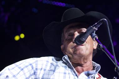 George Strait performs during his “The Cowboy Rides Away Tour” stop at MGM Grand Garden Arena on Saturday, Feb. 1, 2014.