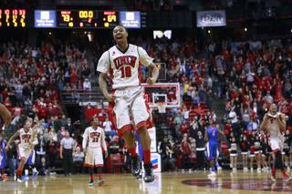 UNLV guard Daquan Cook leaps as time runs out in their Mountain West Conference game against Boise State Saturday, Feb. 1, 2014 at the Thomas & Mack Center. UNLV notched a 73-69 come from behind victory.