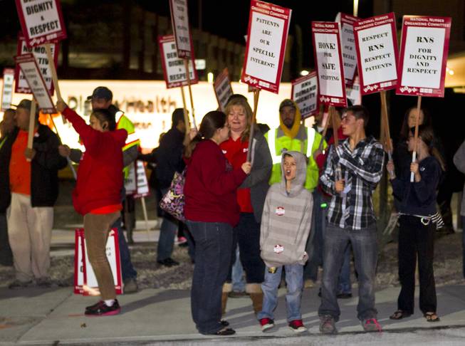 RNs and supporters picket outside St. Rose Dominican - Siena Hospital in Henderson to protest demands by hospital officials which include cuts in staff Tuesday, Feb. 4, 2014.
