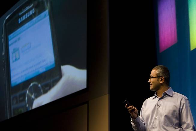 Microsoft Senior Vice President of Portal and Advertising Platform Group Satya Nadella demonstrates some of the features of Live Search on a mobile device during the advance08 Advertising Leadership Forum at the company's campus in Redmond, Wash., Wednesday May 21, 2008.