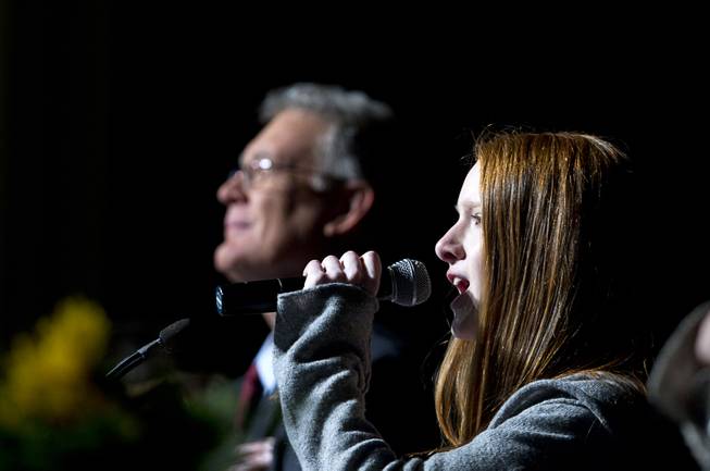 Jessica Banek, 13, signs the national anthem during the State of the City address at Green Valley Ranch Wednesday, Feb. 5, 2014.