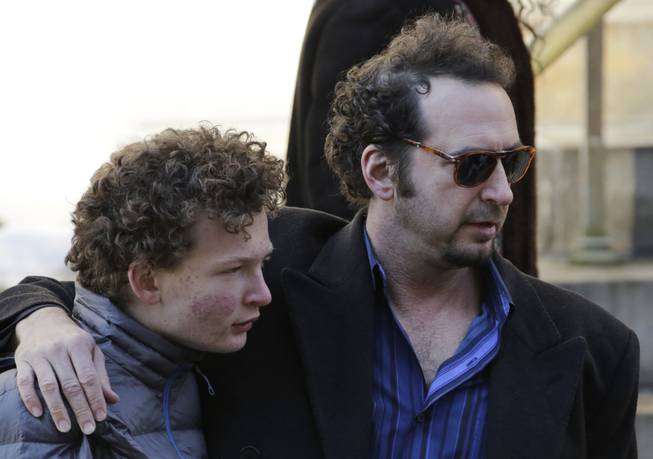 David Bar Katz, right, a friend of actor Philip Seymour Hoffman, arrives for the actor's funeral at the Church of St. Ignatius Loyola, Friday, Feb. 7, 2014 in New York. Hoffman, 46, was found dead Sunday of an apparent heroin overdose.