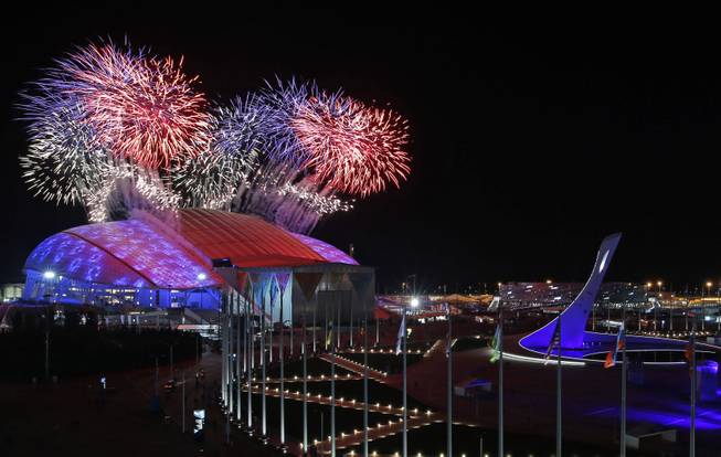 Fireworks are seen over Olympic Park during the opening ceremony of the 2014 Winter Olympics in Sochi, Russia, Friday, Feb. 7, 2014.