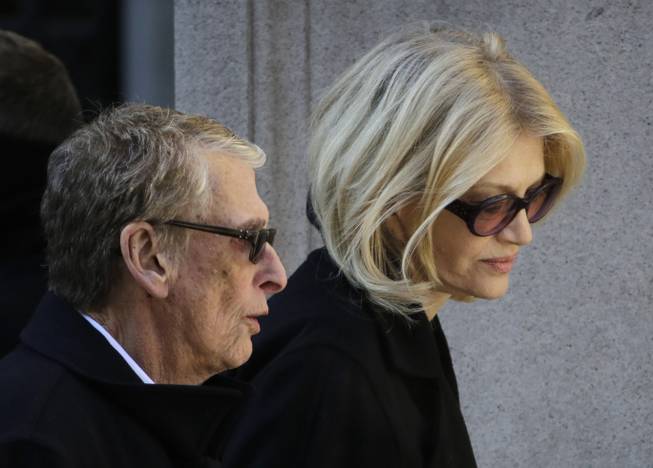 Director Mike Nichols, left, and Diane Sawyer arrive for the funeral of actor Philip Seymour Hoffman at the Church of St. Ignatius Loyola, Friday, Feb. 7, 2014 in New York. Hoffman, 46, was found dead Sunday of an apparent heroin overdose.
