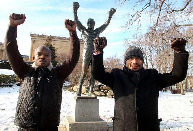 Feb. 7, 2014, Philadelphia, Pa.   ---  " JUST LIKE ROCKY" --- Undefeated WBO World Welterweight champion Timothy Bradley, left, and Manny Pacquiao make a visit to the famous "Rocky" statue at the Philadelphia Museum of Art on the final stop on their media tour. The boxers are promoting their upcoming rematch Saturday, April 12 at the MGM Grand Garden Arena in Las Vegas. Chris Farina - Top Rank