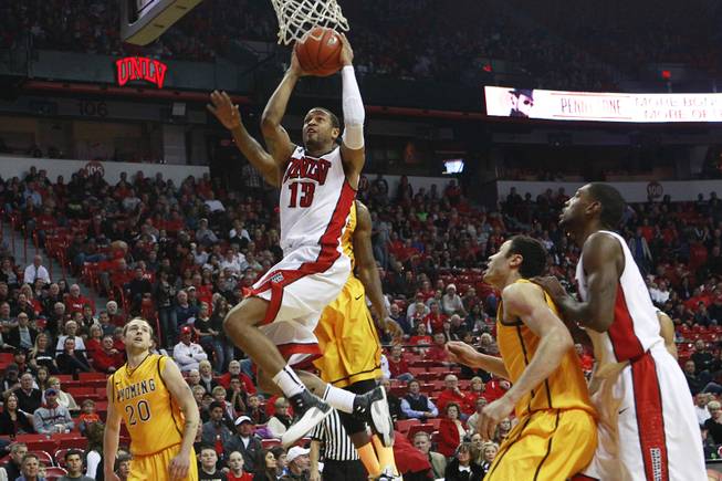 UNLV guard Bryce Dejean Jones drives to the basket against  Wyoming during their game Saturday, Feb. 8, 2014 at the Thomas & Mack Center.