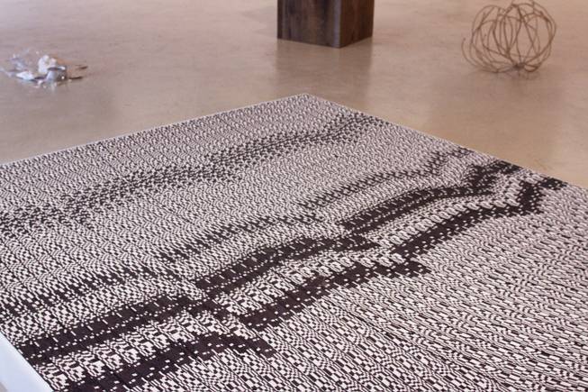 Philip Denker's floor piece, "White Noise" at the "Eco Logic" CAC group exhibit Sunday, Feb. 9, 2014.
