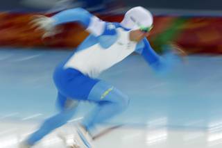 Mika Poutala of Finland takes the start in the second heat of the men's 500-meter speedskating race at the Adler Arena Skating Center during the 2014 Winter Olympics, Monday, Feb. 10, 2014, in Sochi, Russia. 