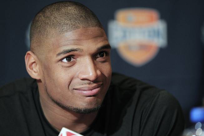 In this Jan. 1, 2014, file photo, Missouri senior defensive lineman Michael Sam speaks to the media during an NCAA college football news conference in Irving, Texas. Sam says he is gay, and he could become the first openly homosexual player in the NFL.