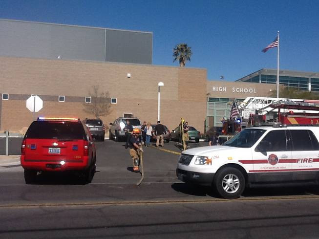 Firefighters respond to a fire at Rancho High School on Monday, Feb. 10, 2014. A stage light ignited the drapery in the theater area of the school, officials said. No injuries were reported.