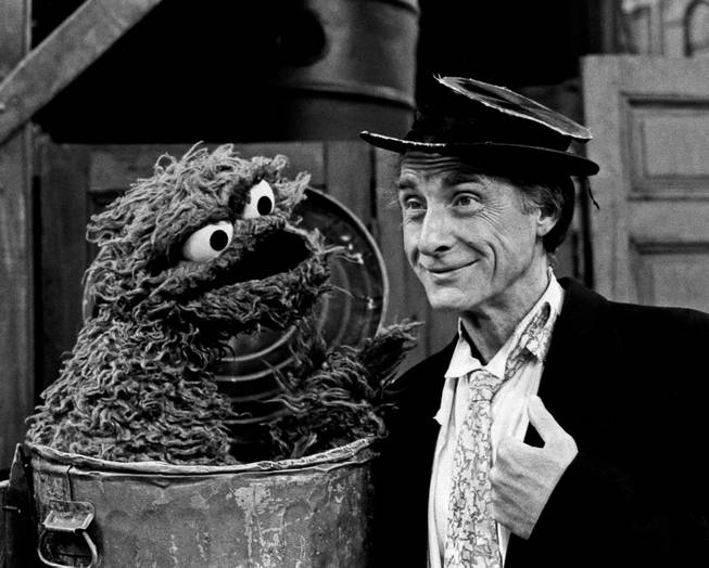 Guest star Sid Caesar portrays his classic "professor" in appearance set for Sesame Street's 15th anniversary season, which begins on the nation's 302 PBS station on Nov. 19, 1985. Oscar the Crouch teaches the professor between "loud" and "quiet" in a segment that will be broadcast. 