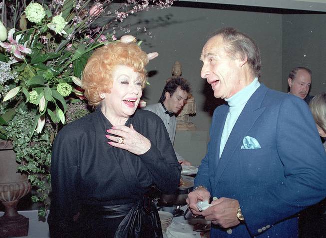 Entertainers Lucille Ball and Sid Caesar share a laugh at a party inaugurating the Fourth Annual Television Festival of the Museum of Broadcasting in Los Angeles, Calif., on Tuesday, March 3, 1987.