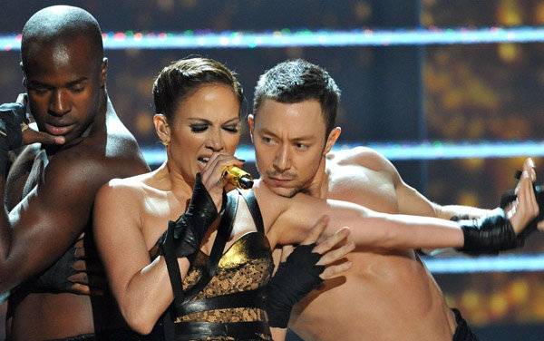 Jennifer Lopez and dancer Zac Brazenas, right, in concert.