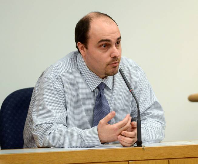 William Cormier, charged with first-degree murder in the death of former Pensacola newspaper reporter Sean Dugas, testifies in his own defense Wednesday, Feb. 12, 2014, in Pensacola, Fla.