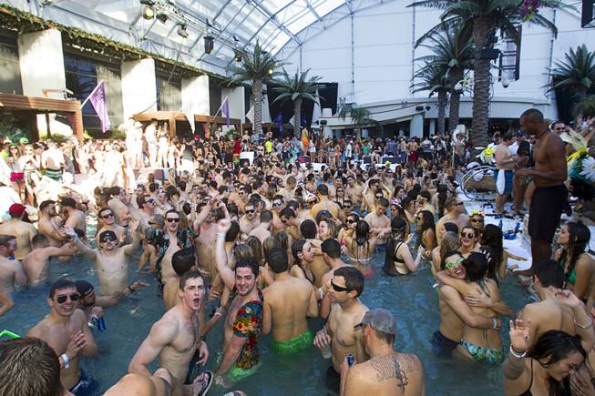 Partygoers crowd the pool during the Halfway to EDC and first winter pool party at Marquee Dayclub on Sunday, Feb. 16, 2014, in the Cosmopolitan of Las Vegas.
