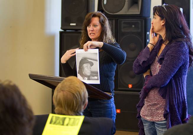 Mary Borchers, left, and Shannon Forsythe, executive director of Run 2 Rescue, brief volunteers about missing woman Jessie Foster at East Vegas Christian Center Monday, Feb. 17, 2014. The women are looking for information on Foster, a Canadian, who went missing in 2006. She had been living in North Las Vegas.