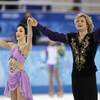 Meryl Davis and Charlie White of the United States acknowledge the crowd after completing their routine in the ice dance free dance figure skating finals at the Iceberg Skating Palace during the 2014 Winter Olympics, Monday, Feb. 17, 2014, in Sochi, Russia.