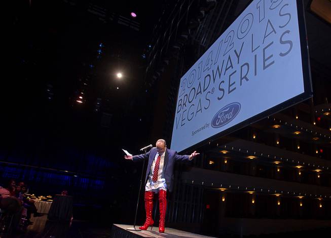 Myron Martin, president/CEO of the Smith Center for the Performing Arts, wears kinky boots as he announces the 2014-2015 Broadway Las Vegas Series at the Center Tuesday, Feb. 18, 2014. The Tony Award-winning "Kinky Boots" will be coming to the Smith Center in September.