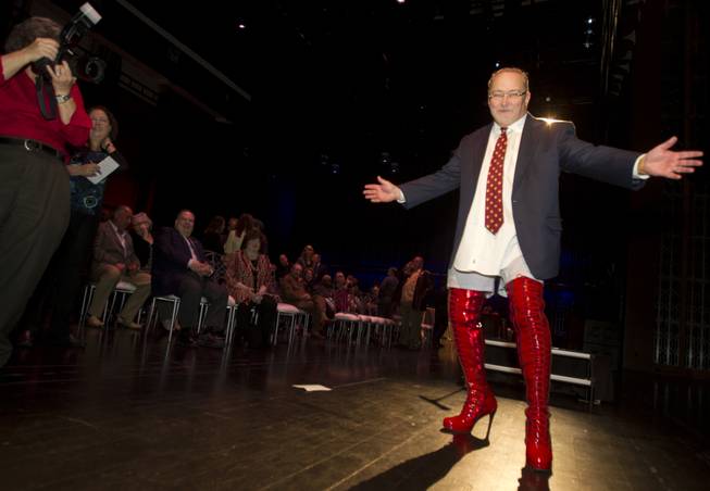 Myron Martin, president and CEO of the Smith Center for the Performing Arts, wears kinky boots while announcing the 2014-15 Broadway Las Vegas Series at the center Tuesday, Feb. 18, 2014. The Tony Award-winning "Kinky Boots" is coming to the Smith Center in September. 