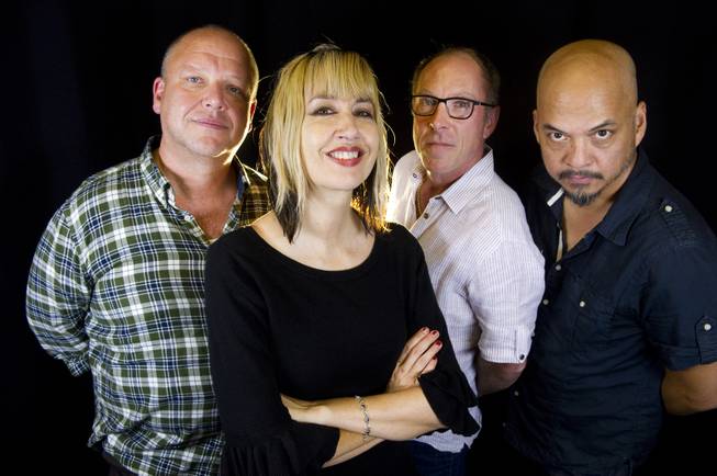Rock band Pixies, from left, Black Francis, Kim Shattuck, David Lovering and Joey Santiago, in a portrait to promote their new EP and upcoming tour dates, on Friday, Sept. 20, 2013, in New York.