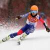 Violinst Vanessa Mae, starting under her father's name as Vanessa Vanakorn for Thailand, makes a turn in the first run of the women's giant slalom at the Sochi 2014 Winter Olympics, Tuesday, Feb. 18, 2014, in Krasnaya Polyana, Russia.