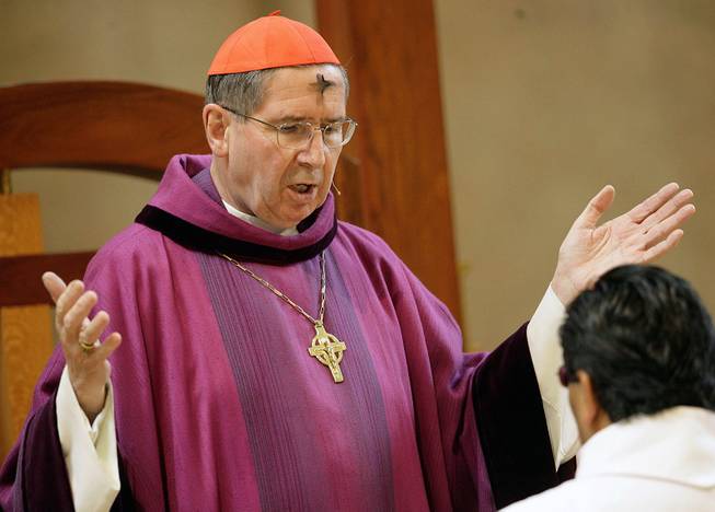 Cardinal Roger Mahony officiates during Ash Wednesday services at the Cathedral of Our Lady of the Angels in Los Angeles, Feb. 6, 2008. The Roman Catholic Archdiocese of Los Angeles will pay $13 million to settle 17 clergy abuse lawsuits. 