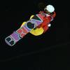 Liu Jiayu goes airborne, revealing a snowboarding brand's logo, while competing for China in the women's halfpipe at the 2014 Winter Olympics in Rosa Khutor, Russia, on Wednesday, Feb. 12, 2014. 