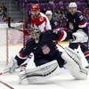 USA goaltender Jonathan Quick comes out of the crease to defend the goal in the third period of a men's ice hockey game at the 2014 Winter Olympics, Saturday, Feb. 15, 2014, in Sochi, Russia.