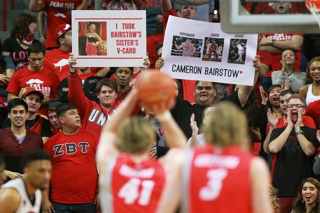 UNLV students try to distract New Mexico forward Cameron Bairstow as he takes a free throw during the first half of their Mountain West Conference game Wednesday, Feb. 19, 2014 at the Thomas & Mack Center.
