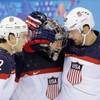 USA defenseman Kevin Shattenkirk, goaltender Jonathan Quick and forward Blake Wheeler celebrate their 5-2 win over the Czech Republic after the men's quarterfinal hockey game in Shayba Arena at the 2014 Winter Olympics, Wednesday, Feb. 19, 2014, in Sochi, Russia.